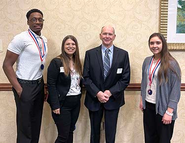 Tyrik King, Sami Talsma, Arlen Leiker, and Candace Taylor at the PTK luncheon on April 1, 2022, in Junction City.