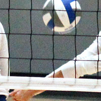 Player bumping a volleyball