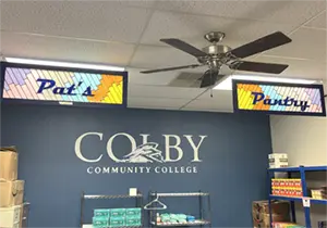 Pat's Pantry stained glass sign hanging in the pantry